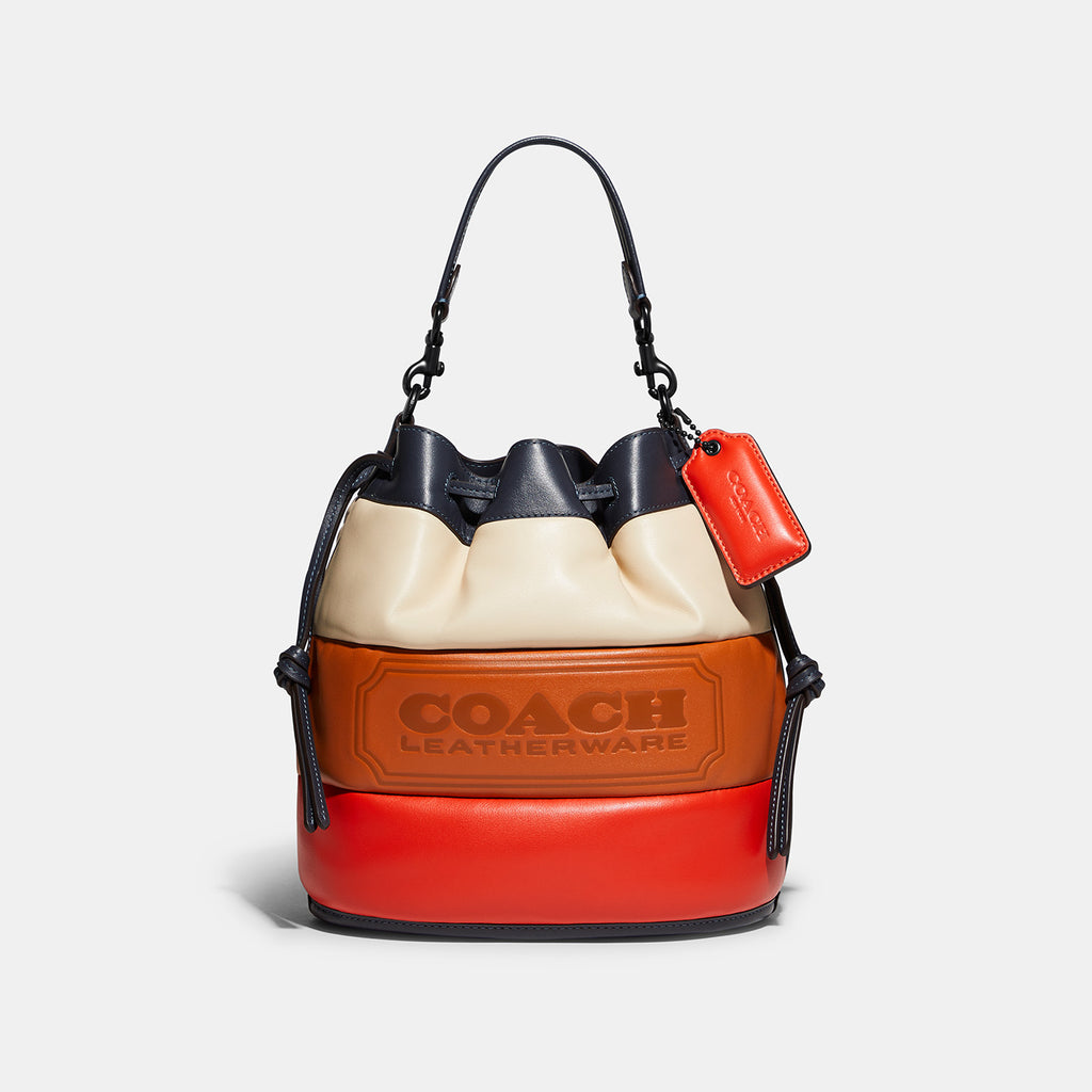COACH FIELD BUCKET BAG WITH COLORBLOCK QUILTING AND COACH BADGE –