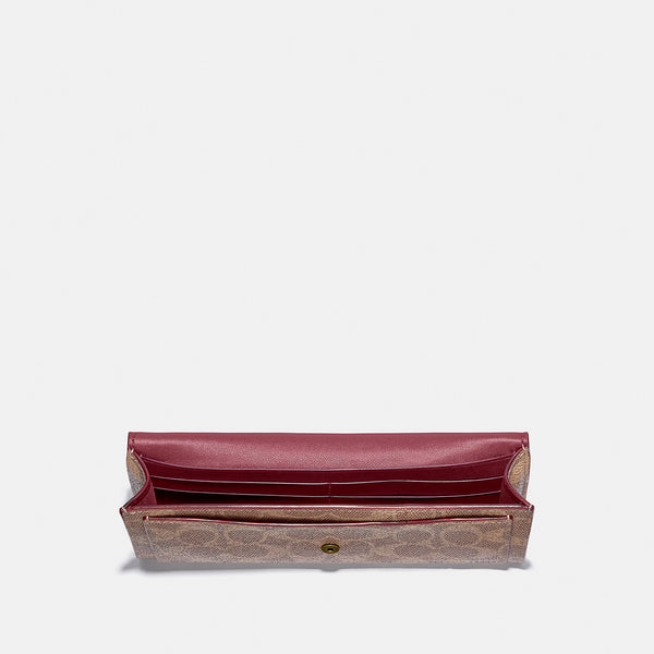 COACH WYN SOFT WALLET IN COLORBLOCK SIGNATURE CANVAS