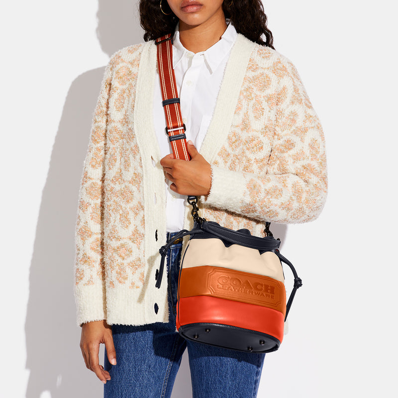 COACH FIELD BUCKET BAG WITH COLORBLOCK QUILTING AND COACH BADGE